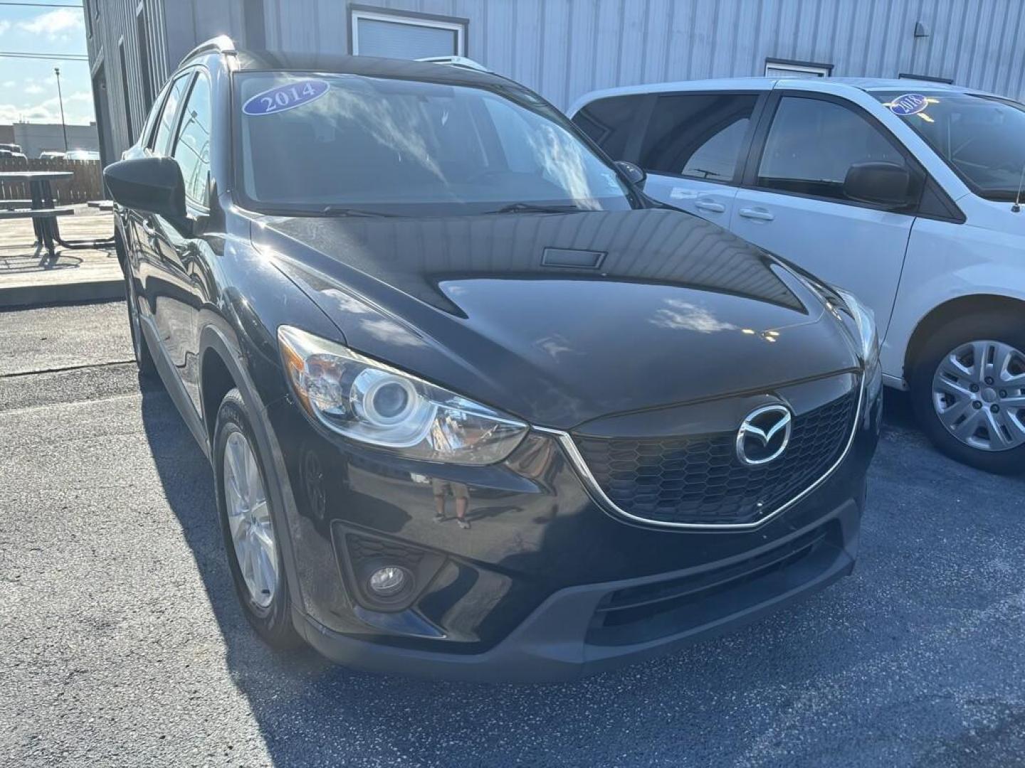 2014 BLACK MAZDA CX-5 TOURING (JM3KE2CY6E0) , located at 100 West Coliseum Boulevard, Fort Wayne, IN, 46805, (260) 471-0567, 41.118340, -85.141014 - Photo#0