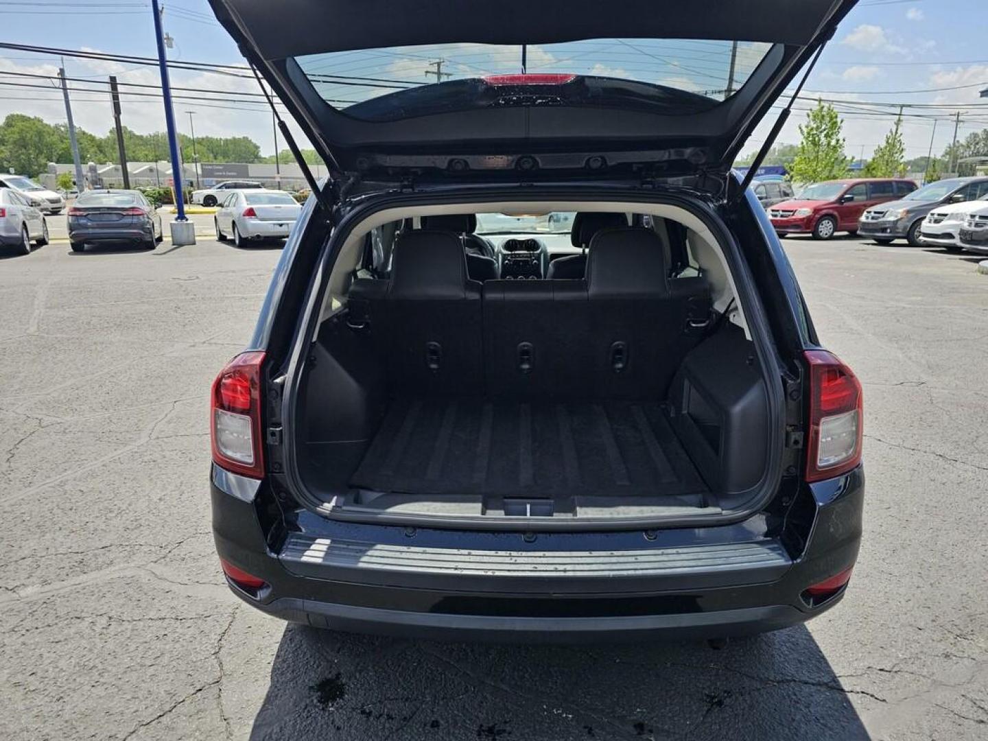 2016 BLACK JEEP COMPASS LATITUDE (1C4NJDEB6GD) , located at 5744 Central Avenue, Toledo, OH, 43615, (419) 724-0130, 41.676781, -83.682137 - Photo#4