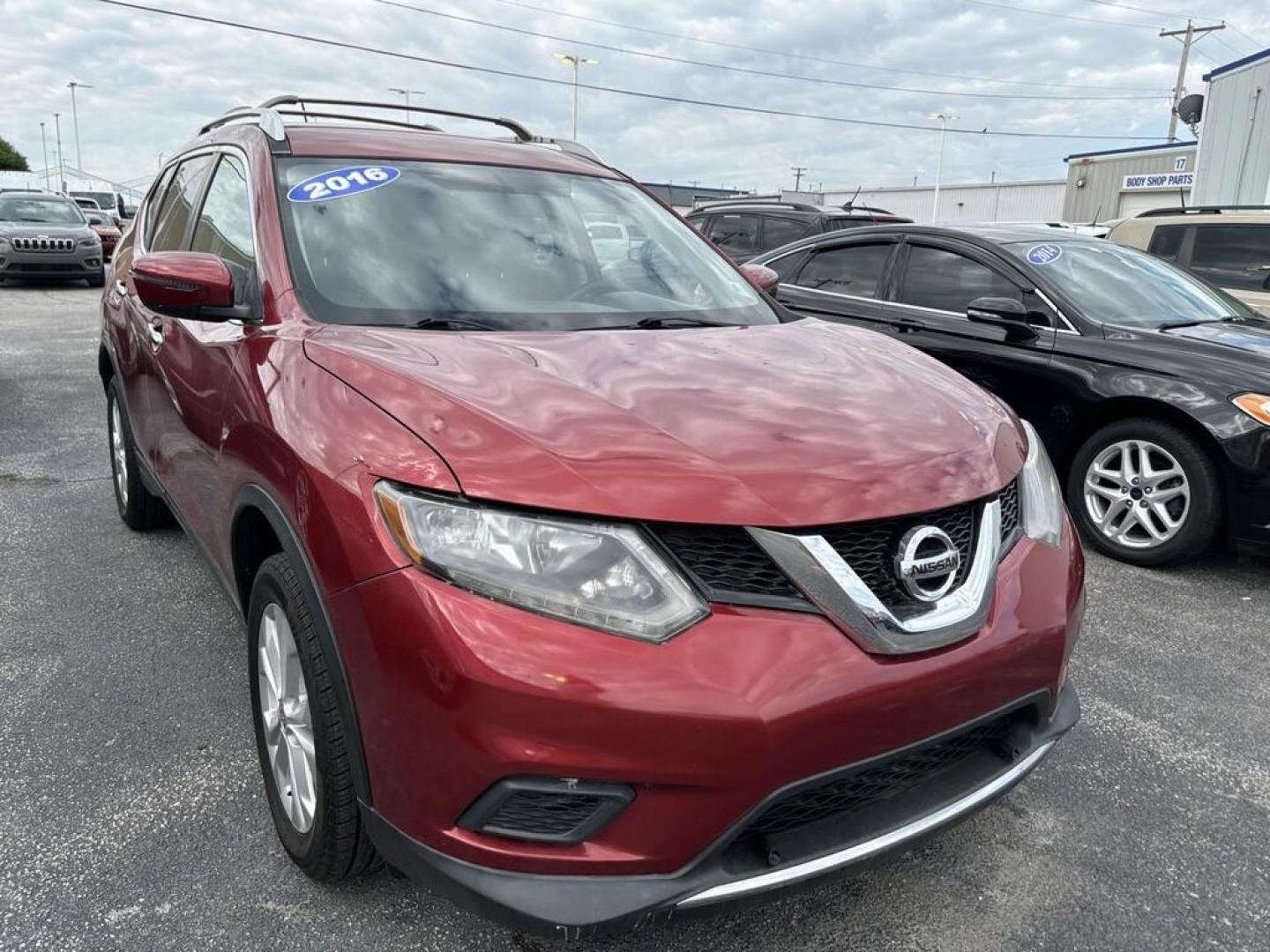 2016 RED NISSAN ROGUE S; SL; SV (KNMAT2MT6GP) , located at 100 West Coliseum Boulevard, Fort Wayne, IN, 46805, (260) 471-0567, 41.118340, -85.141014 - Photo#0