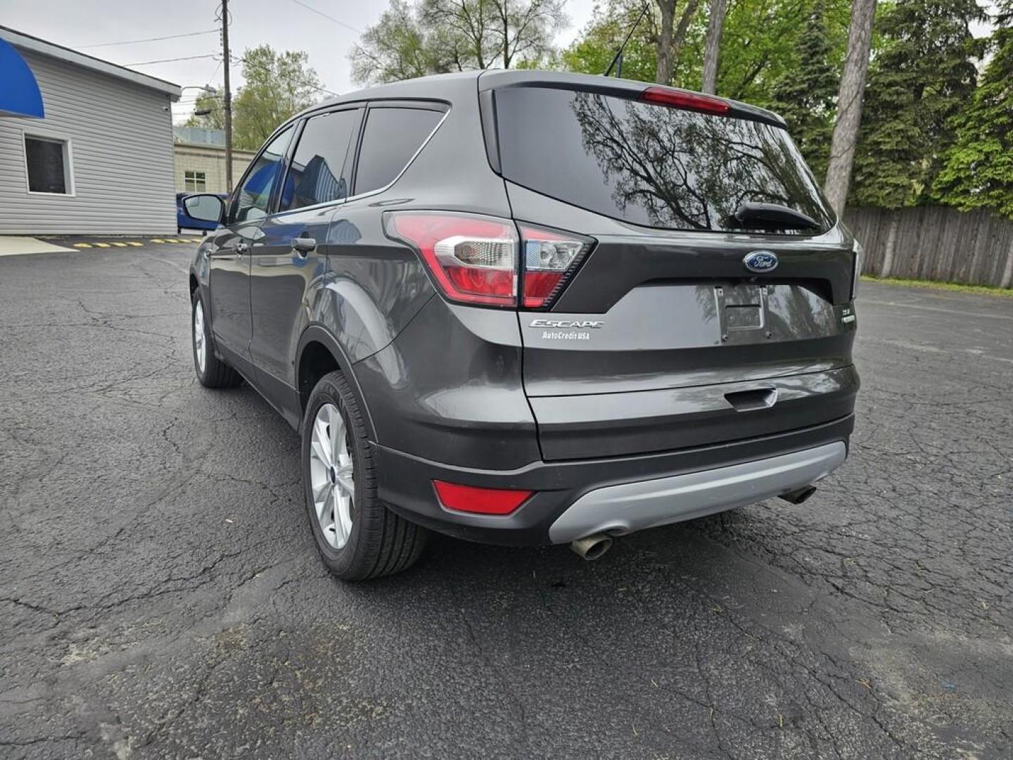 2017 GRAY FORD ESCAPE SE (1FMCU0GD9HU) , located at 5744 Central Avenue, Toledo, OH, 43615, (419) 724-0130, 41.676781, -83.682137 - Photo#2