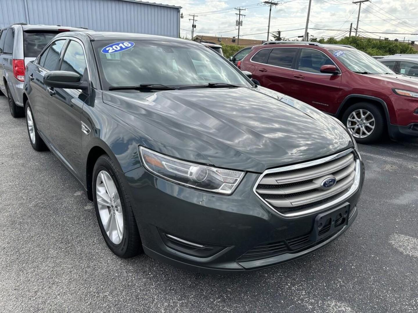 2016 GREEN Ford TAURUS SEL (1FAHP2E83GG) , located at 100 West Coliseum Boulevard, Fort Wayne, IN, 46805, (260) 471-0567, 41.118340, -85.141014 - Photo#0