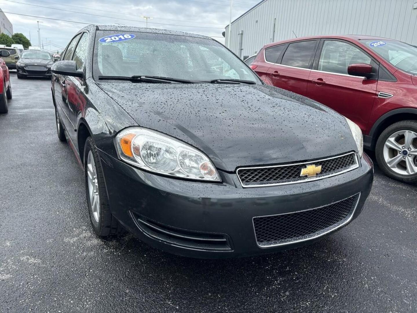 2016 BLACK CHEVROLET IMPALA LIMITED LT (2G1WB5E36G1) , located at 100 West Coliseum Boulevard, Fort Wayne, IN, 46805, (260) 471-0567, 41.118340, -85.141014 - Photo#0