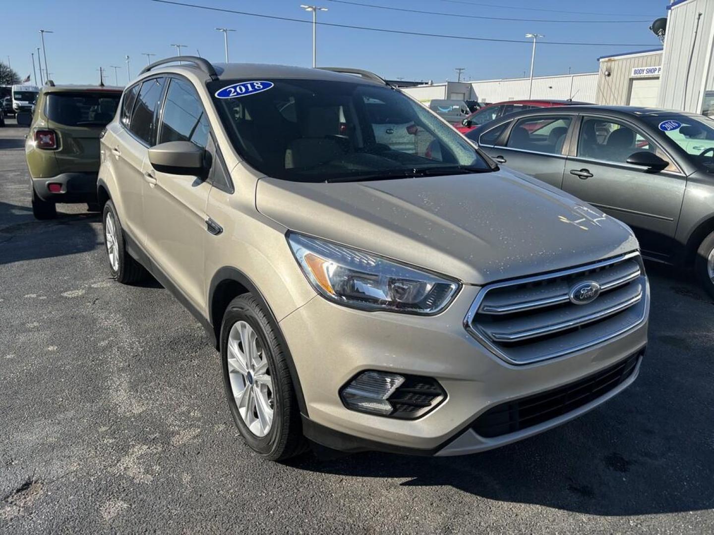 2018 TAN Ford ESCAPE SE (1FMCU0GD2JU) , located at 100 West Coliseum Boulevard, Fort Wayne, IN, 46805, (260) 471-0567, 41.118340, -85.141014 - Photo#0