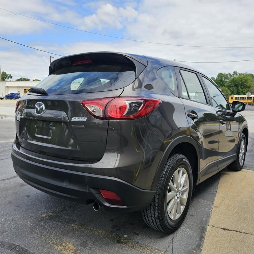 2016 SILVER MAZDA CX-5 SPORT Sport (JM3KE2BY9G0) with an 2.5L I-4 engine, 6 speed AT transmission, located at 502 South Main Street, Columbia City, IN, 46725, (260) 244-4645, 41.151382, -85.490578 - Photo#2