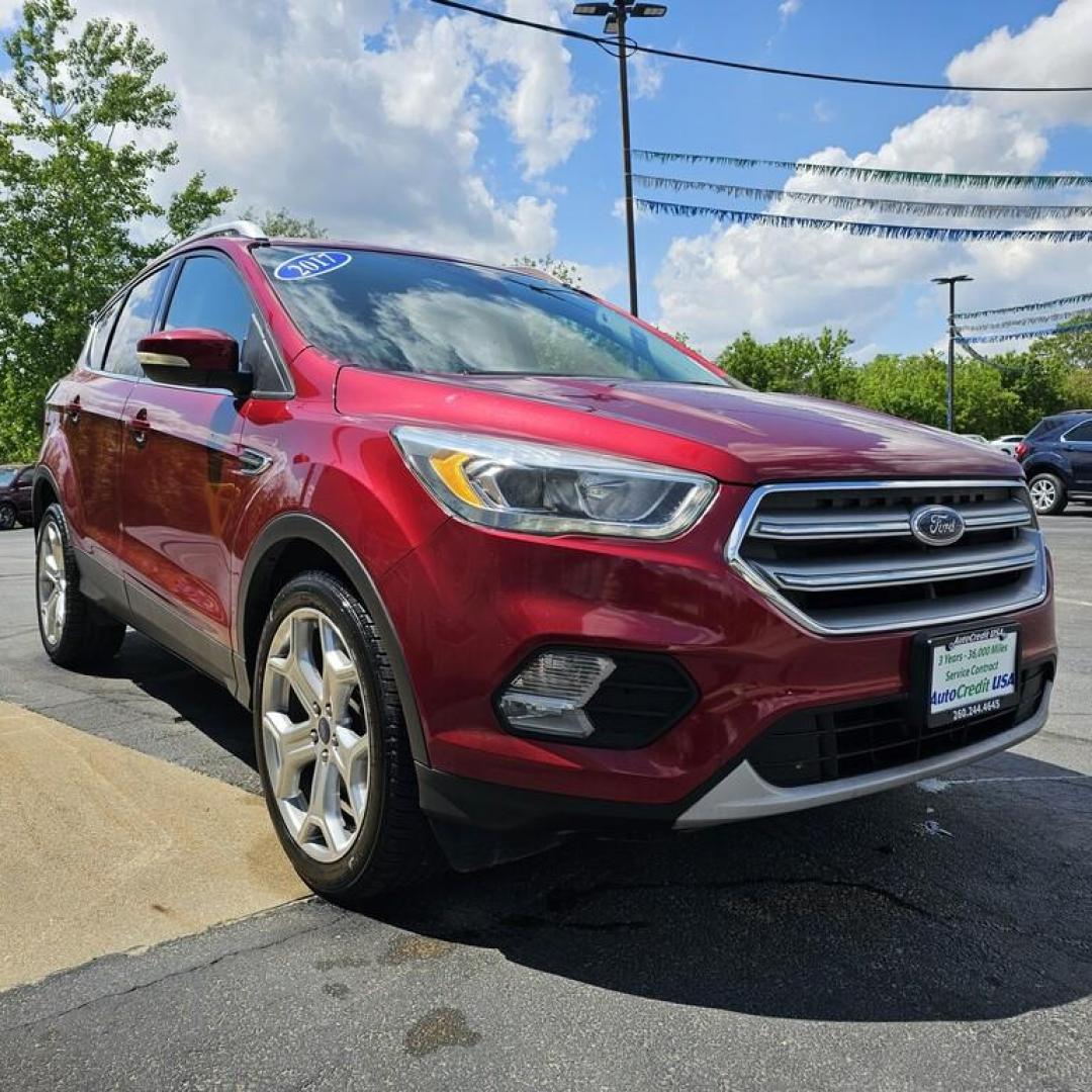 2017 MAROON FORD ESCAPE TITANIUM (1FMCU0JD4HU) , located at 502 South Main Street, Columbia City, IN, 46725, (260) 244-4645, 41.151382, -85.490578 - Photo#1