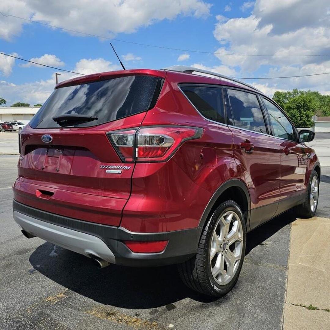 2017 MAROON FORD ESCAPE TITANIUM (1FMCU0JD4HU) , located at 502 South Main Street, Columbia City, IN, 46725, (260) 244-4645, 41.151382, -85.490578 - Photo#2