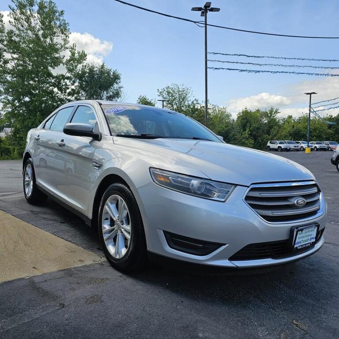 2014 SILVER FORD TAURUS SEL (1FAHP2E85EG) with an 3.5L V-6 engine, 6 speed AT transmission, located at 502 South Main Street, Columbia City, IN, 46725, (260) 244-4645, 41.151382, -85.490578 - Photo#1