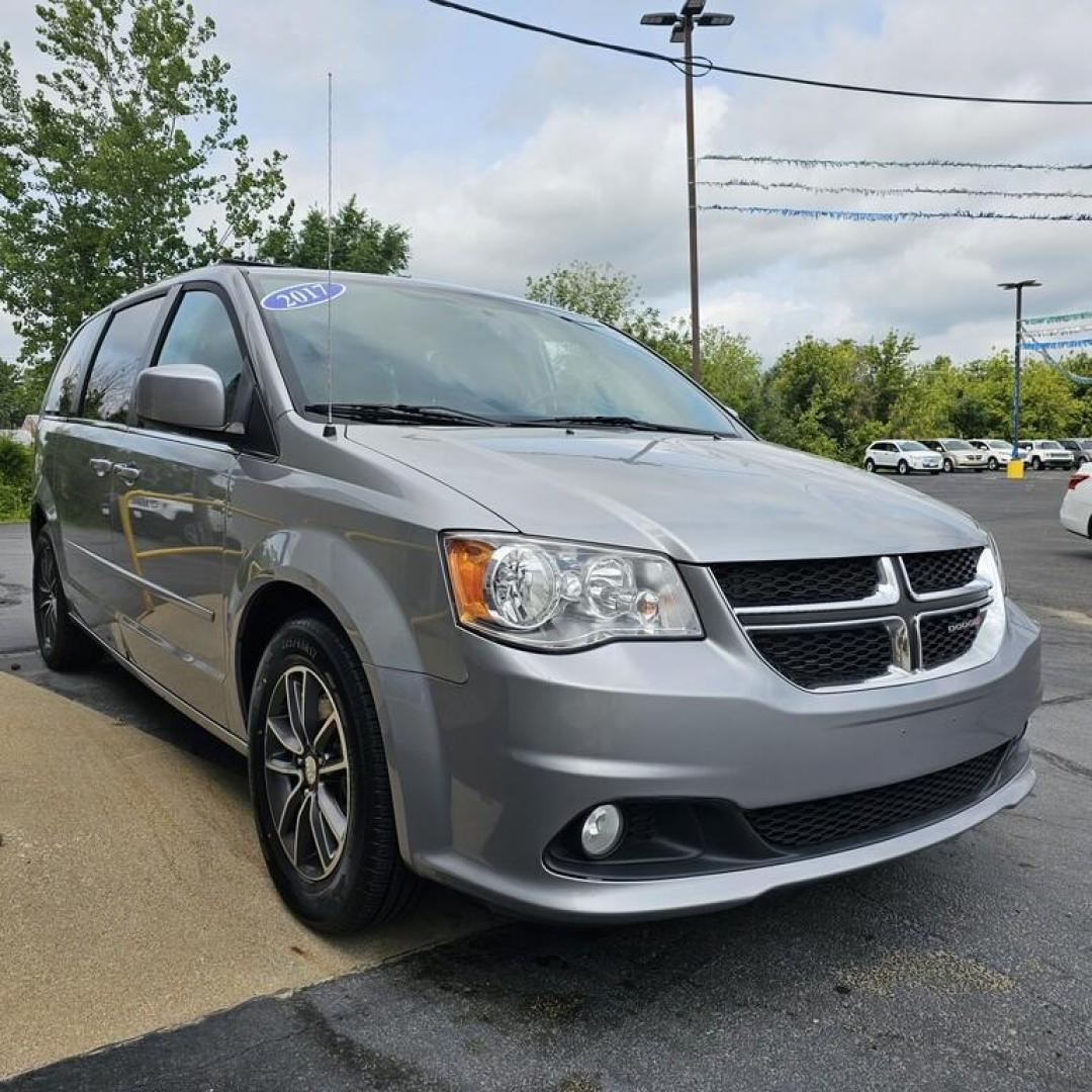 2017 SILVER DODGE GRAND CARAVAN SXT SXT (2C4RDGCG1HR) with an 3.6L V-6 engine, 6 speed AT transmission, located at 502 South Main Street, Columbia City, IN, 46725, (260) 244-4645, 41.151382, -85.490578 - Photo#1