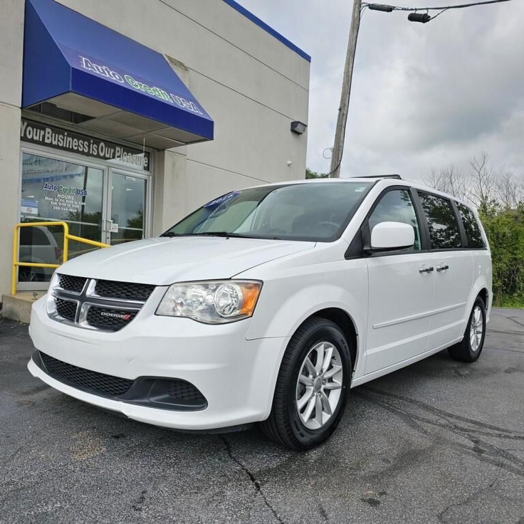 2016 WHITE DODGE GRAND CARAVAN SXT SXT (2C4RDGCG9GR) with an 3.6L V-6 engine, 6 speed AT transmission, located at 502 South Main Street, Columbia City, IN, 46725, (260) 244-4645, 41.151382, -85.490578 - Photo#0