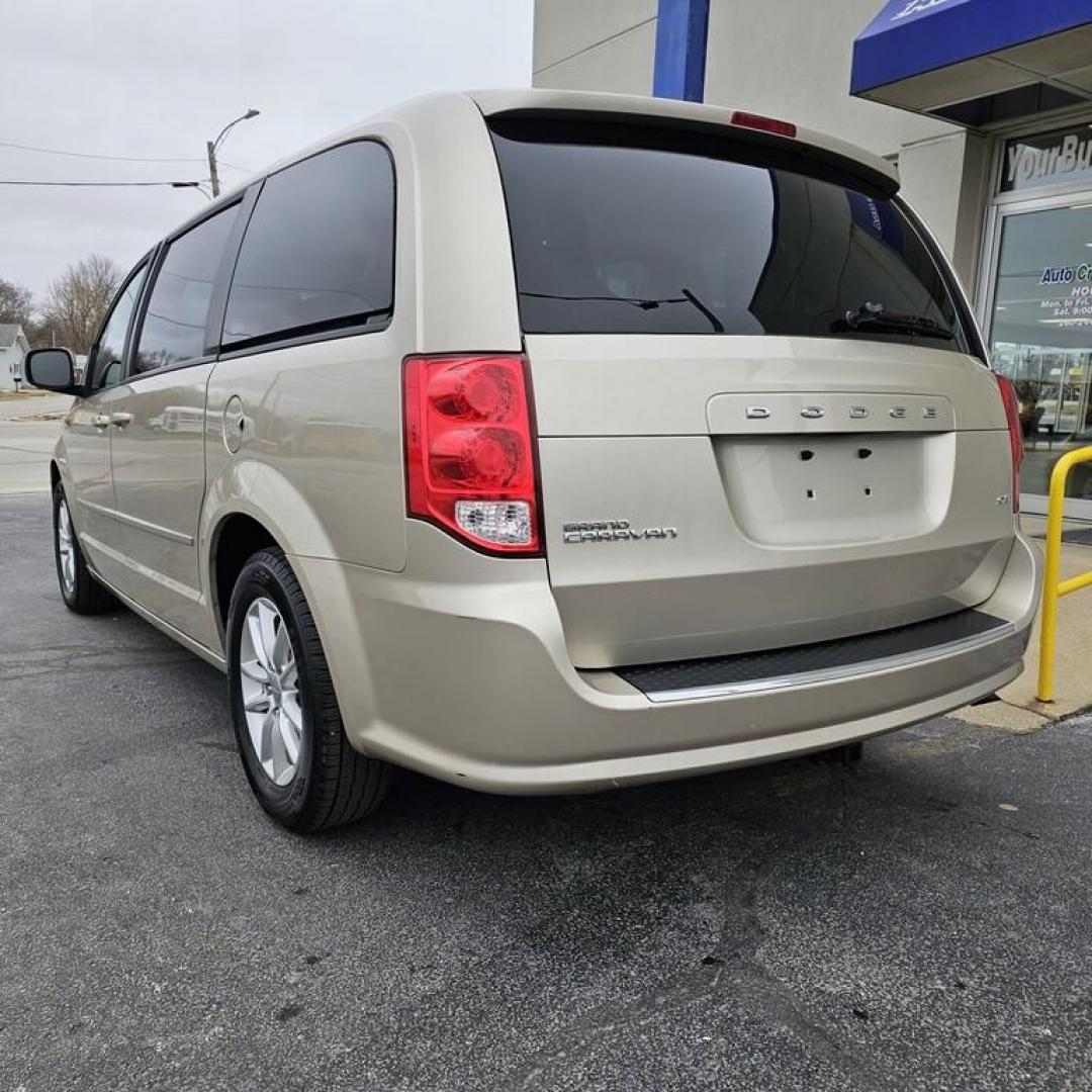 2015 GOLD DODGE GRAND CARAVAN SXT SXT (2C4RDGCG9FR) with an 3.6L V-6 engine, 6 speed AT transmission, located at 502 South Main Street, Columbia City, IN, 46725, (260) 244-4645, 41.151382, -85.490578 - Photo#3