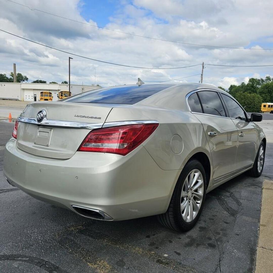 2014 GOLD BUICK LACROSSE (1G4GB5G31EF) with an 3.6L V-6 engine, 6 speed AT transmission, located at 502 South Main Street, Columbia City, IN, 46725, (260) 244-4645, 41.151382, -85.490578 - Photo#2