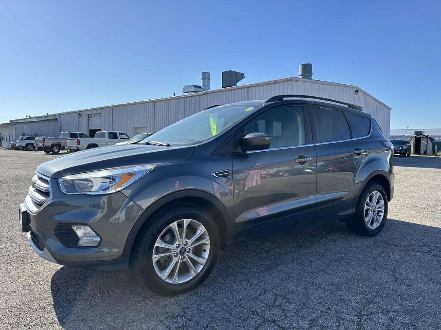 2018 GRAY FORD ESCAPE SE (1FMCU0GD0JU) , located at 15 Petro Dr, Warsaw, IN, 46582, (574) 306-0055, 41.273563, -85.857544 - Photo#0