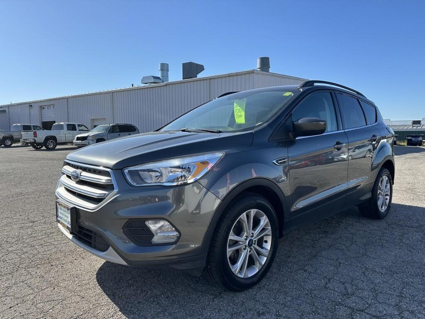 2018 GRAY FORD ESCAPE SE (1FMCU0GD0JU) , located at 15 Petro Dr, Warsaw, IN, 46582, (574) 306-0055, 41.273563, -85.857544 - Photo#1